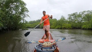 CAPTURE OF MUDCRAB ON A RAINY DAY IN THE CANOE