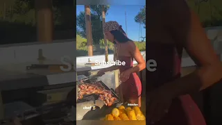 Dua Lipa cooking shrimp in new video