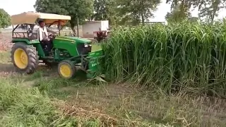 Grass cutter machine on john deere tractor