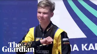 Russian karting champion apologises after appearing to make Nazi salute on podium