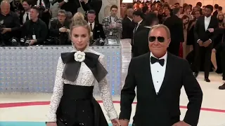 Emily Blunt and Michael Kors walk the red carpet