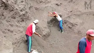 Resting and Eating Together in Between Sand Mining Routines