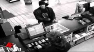 Raw Video: Man Threatens Cashier With Machete