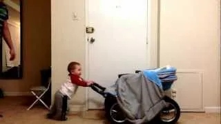 Сын катает коляску