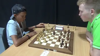 GM Paulius Pultinevicius against chess kid