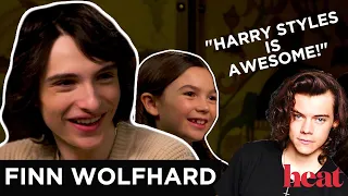 Finn Wolfhard FREAKS OUT over his co-star not knowing 1D & gushes over Harry Styles