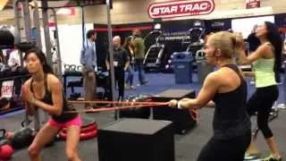 Demoing the new SPRI resistant bands at the IHRSA 2014 trade show in San Diego w/ Mona Noorian