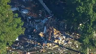 House explodes in New Jersey, man injured driving by