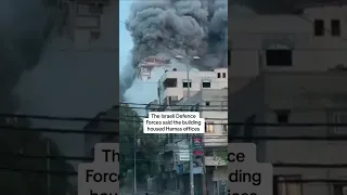 Moment airstrike destroys high-rise building