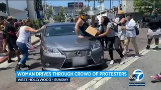 Woman plows car through crowd of protesters in West Hollywood | ABC7