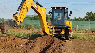 Digging for sewage CAT 432