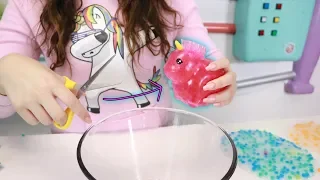 CUTTING SQUISHY ORBEEZ OPEN AND PUTTING IT IN SLIME Slimeatory #518