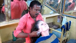 Массаж головы в индийской парикмахерской