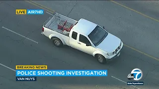 Suspect shot by LAPD in Van Nuys; pickup truck riddled with bullet holes found nearby