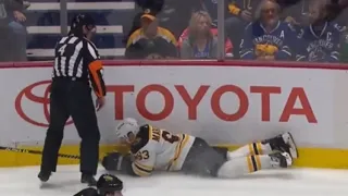 Vancouver Canucks Fans Cheer After Brad Marchand Runs Into Wes McCauley