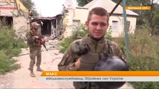 Бойцы АТО подняли украинский флаг в тылу боевиков