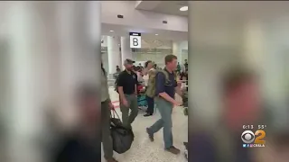 Firefighters Arriving In Australia From LAX Receive Warm Welcome At Sydney Airport