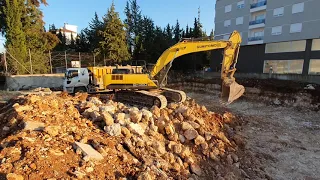 Sumitomo Excavator 300C Truck Loading, Fort, Mercedes, Bmc  Right Side Operator View