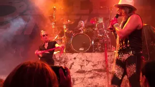 Miley Cyrus and Billy Ray Cyrus join Steel Panther in singing Def Leppard's "Pour Some Sug