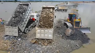 Nice Work Operator Bulldozer Push Stone, Dump Truck Unloading Stone  Building Road on Huge Lake