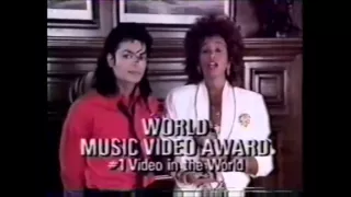 Whitney Houston presents award to Michael Jackson in 1989