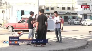 شاب يعود من الغربه ويبيع الدونات والحلويات بأحد شوارع المكلا وإقبال كثير من قبل المشترين