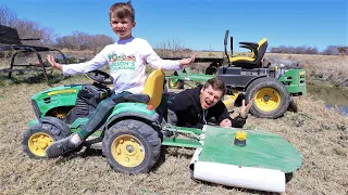 Hudson's new kids mower working on the farm cutting grass and hay | Tractors for kids