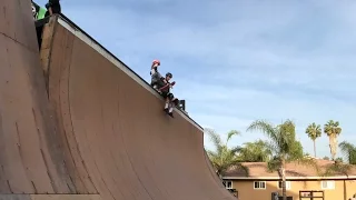 6 year old girl drops into huge skateboard ramp with dads help