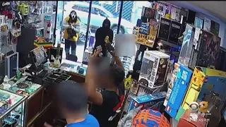 Police looking for at least 2 suspects in 21 armed robberies across the city