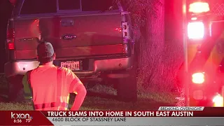 Truck crashes into home in southeast Austin