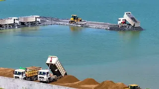 Incredible Many SHACMAN 25Ton Delivery Rock with Dozer SHANTUI DH17 Pushing Rock In Lake