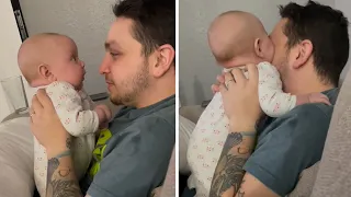 Teething baby literally tries to eat daddy's nose