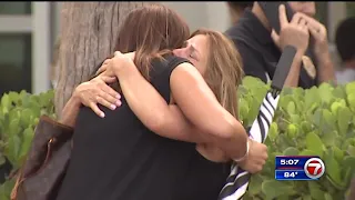 Family members pray loved ones are rescued after Surfside building collapse