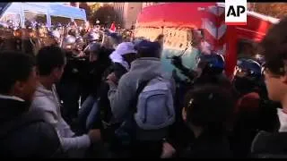 Scuffles, tear gas and water cannon in tense city