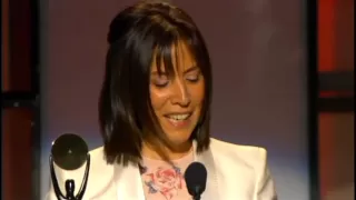 Olivia and Dhani Harrison accept award George Harrison Rock and Roll Hall of Fame inductions 2004