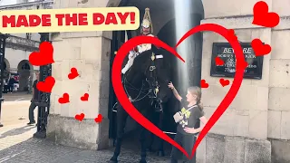 Heartwarming Moment: King's Guard Horse Shares Affection with Little Girl.