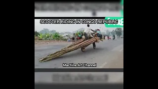 SCOOTER RIDING IN CONGO (WOODEN BIKE)