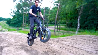 vies enge jumps met elektrische vouwfiets met dikke bande like deze video - Vitilan V3