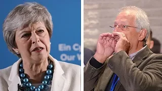 Heckler asks Theresa May to 'resign'