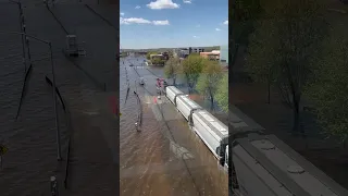 Canadian Pacific train pushing through the flood in downtown Davenport, Iowa 5/1/23.