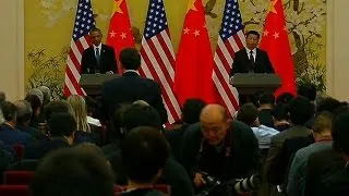 Chinese President Xi Jinping ignores a question from an American reporter