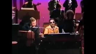 Stevie Wonder performs a talkbox rendition of "Close To You" and "Never Can Say Goodbye"