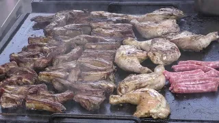 Huge Grill, Sausages, Ribs and Meat. Italian Street Food Fair