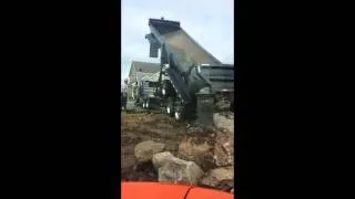 Peterbilt End Dump with C16 Dumping BIG Boulders