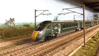 Hitachi IET with DCC sound. Arrives on diesel, departs on electric