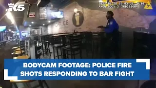 Bodycam footage shows police firing shots in response to bar fight