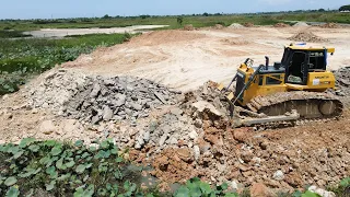 The Greatest Land Reclamation Operator Bulldozer SHANTUI DH17C2 Pushes Dirt, Dump Truck Unloaded