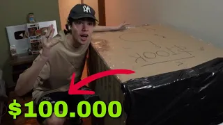 abriendo caja misteriosa de $100.000