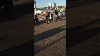 60 year Old man dancing on Santa Monica Pier