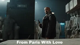 From Paris With Love: Charlie Wex (Travolta) in a bloody shootout with dummies and Chinese gangsters